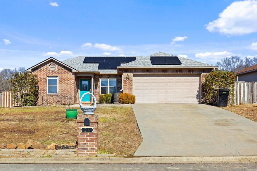 Move-in ready and packed with upgrades!  This 4-bedroom, 2-bath, 1,414 sq ft home features a new roof/2025 and paid-off solar panels at closing-offering long-term savings and efficiency.  Inside, you'll find new LVP flooring throughout, fresh professional paint with a white marker board paint section in the hallway, updated hallway lighting, and a new hot water heater/2025.  The new stainless steel refrigerator, washer, and dryer all convey, making this home truly turnkey.  Garbage disposal replaced in 2024. You will enjoy the garden in the backyard with blueberries, asparagus, black berries, onion, garlic, & rosehips. There is an existing survey.  A smart investment with modern updates already in place!  Don't miss this one!!