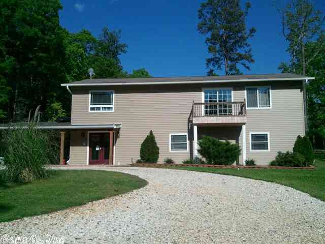 Unique floor plan. Room to grow. Can be a four bedroom. Lots of extras. Wood and tile floors, no carpet. Central vacuum, surround sound, intercom system, granite counter tops and much more. Garland County, Benton schools. Fruit trees DNC