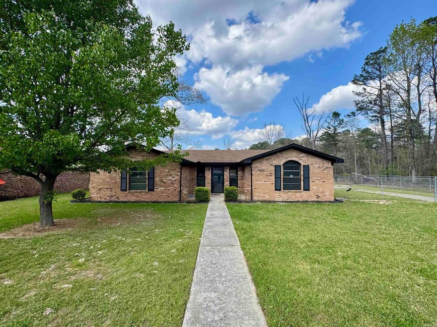 Step into this beautifully remodeled 3-bedroom, 2-bathroom home offering almost 2,000 square feet of living space, thoughtfully designed with comfort, style, and functionality in mind.  This inviting home features: *New paint throughout *Updated flooring *Modern fixtures *Spacious family room, den, or bonus room *Cozy wood-burning fireplace in the living/den area *Walk-in shower and jetted tub Outdoor patio area perfect for relaxing * Storage building * Large parking space * Situated on approximately 0.331 acres in a quiet cul-de-sac  Outside, you will enjoy a relaxing patio area with plenty of room for family gatherings, entertaining, and enjoying the spacious backyard. This home offers the perfect blend of updated features, generous space, and a desirable location.