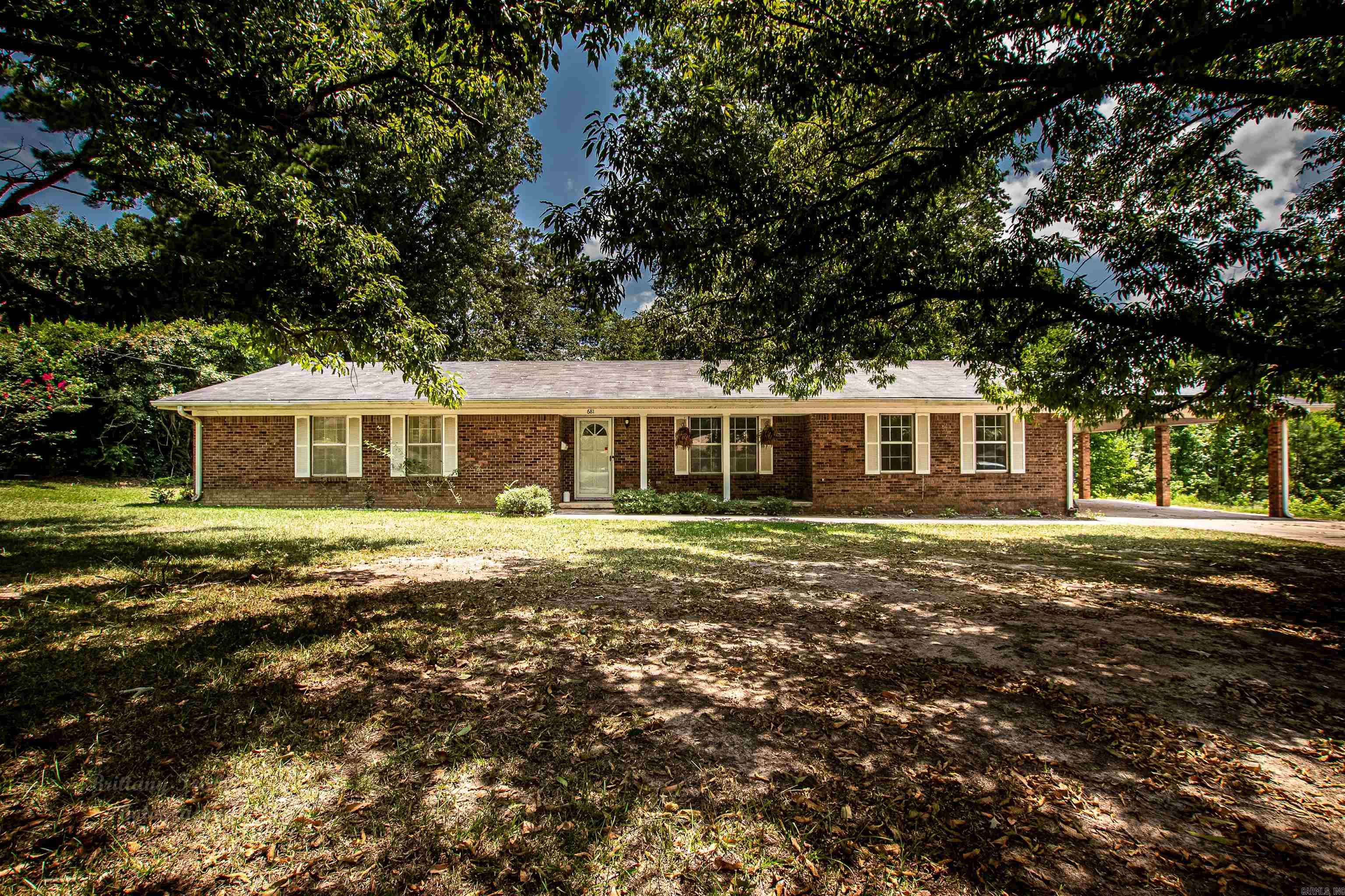This charming house is nestled in a quiet little area of Camden. There is easy access to shopping, entertainment, and other amenities and events that Camden boasts. With this home the features are so many! There are 3 generous sized bedrooms 2 full bathrooms There are two living rooms in this house! Stove does not convey, it is the property of the current renter. Kitchen fridge will convey All other appliances do not convey. Equipped with solar panels that will convey with the home. The innovation of the solar panels have made a generous electric bill reduction on the home. Solar panels will be paid off by the seller with an acceptable offer Currently a rental. Ask agent for details of occupancy Naomi Garretson (870) 352-1695 KO Realty Group Phone: (870) 315-0302 Pre approval required required prior to showing Agents see notes in CARMLS for showing details. NO SHOWINGS UNTIL MARCH 7TH