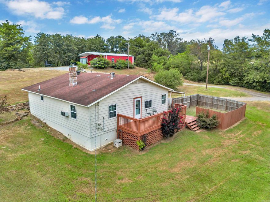 Explore the possibilities with this rare find!!  There's a super cute 3/1.5 house that sellers currently use as a successful Airbnb and there's also a 1200 sq.ft. Barndominium that was built in 2017 and use to be used as Movie House Winery! All of this situated on 4 acres inside the city limits of Morrilton but with a country feel! Zoning is Industrial 1. Majority of the property is fenced. There's also a silo, a pole barn and a great pasture area!