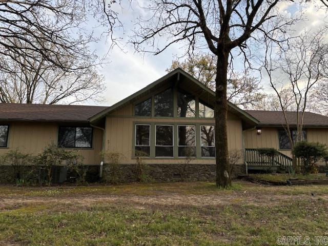 This 3/4 bed 2 bath home sits elegantly poised on a ridge encompassed by nearly 3 acres. With a little updating this house will be a gem in the Treasure Hills neighborhood. House has vaulted ceilings with lots of glass and a deck overlooking the beautiful back yard. The carpet has been removed from bedrooms and living rooms, and is almost ready for new carpet or LVP. The outside decking needs to be replaced so be careful walking on it. House has durable aluminum siding, roof is only a couple years old, and the septic lines were recently replaced. The house comes with a whole house generator that comes on automatically when power goes off. Priced to sell quickly, shedule your showing before it’s gone!