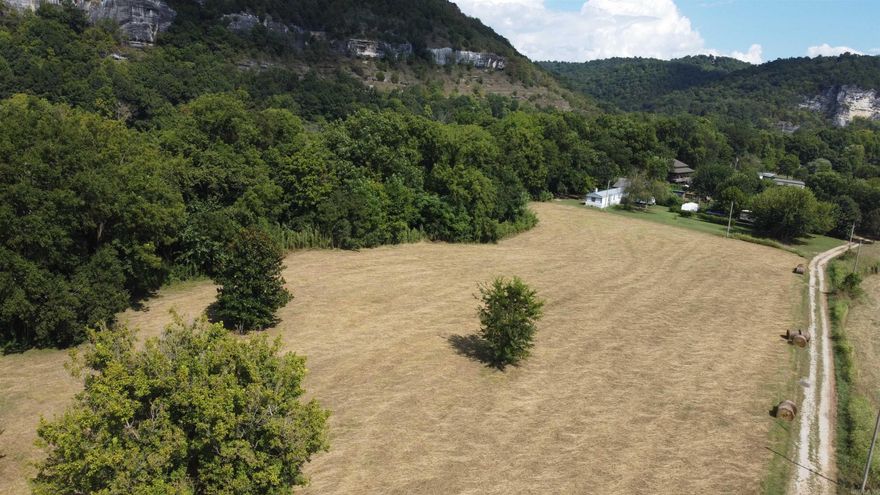 Looking for a getaway or a place to build your dream home, here is a great property with beautiful views of bluffs, mountains and the famous White River.  Walk down to the river and fish or very close to public access to launch your boat.  Take a look not many of this kind of location left.