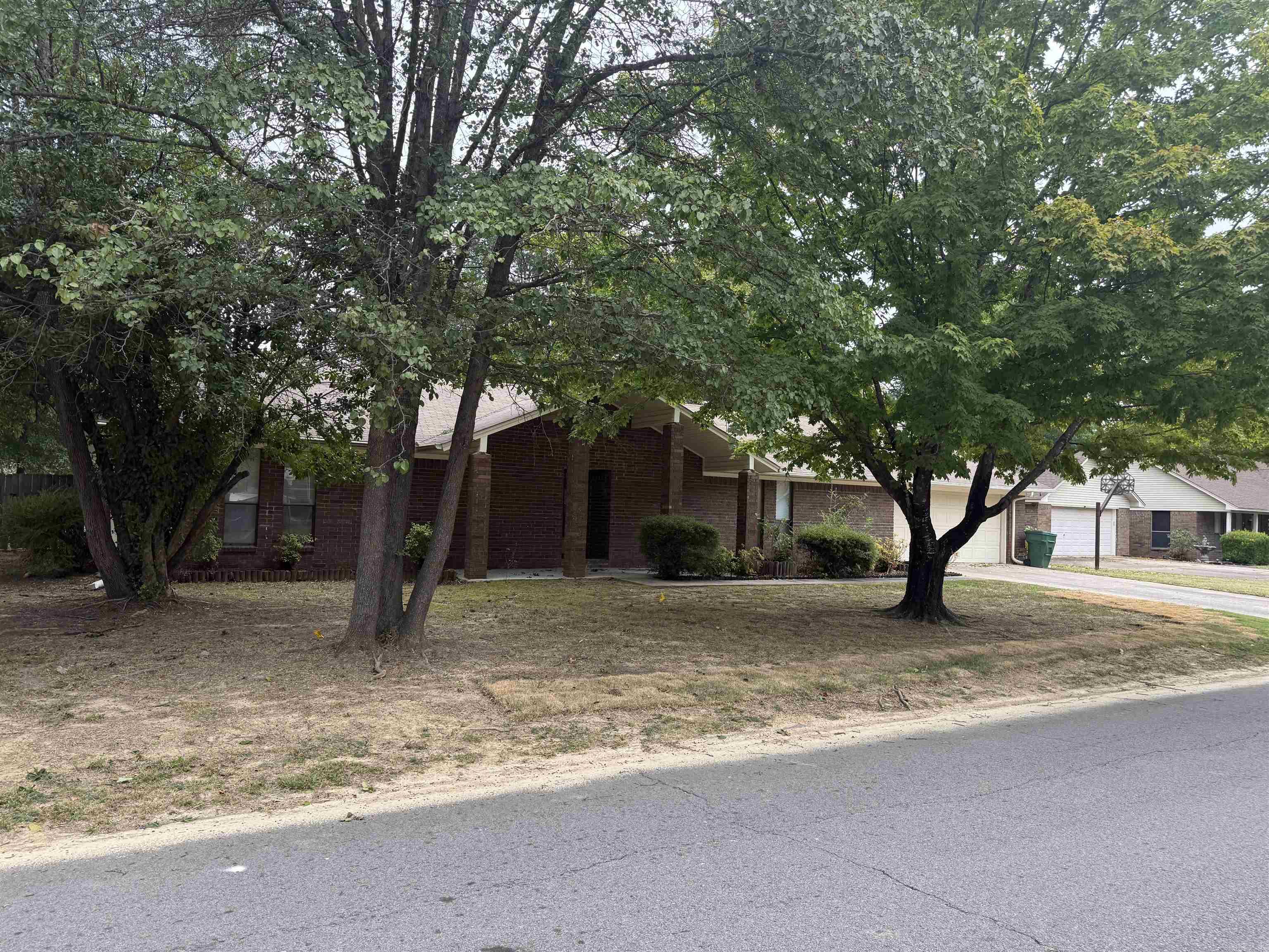Great home in Tucker Creek. Large living /Dining combo with brick fireplace. Spacious eat in kitchen with breakfast bar and pantry. Sunroom leads to large fenced in yard. Oversized garage with storage room, and workspace. Well maintained, just needs some cosmetic updating.