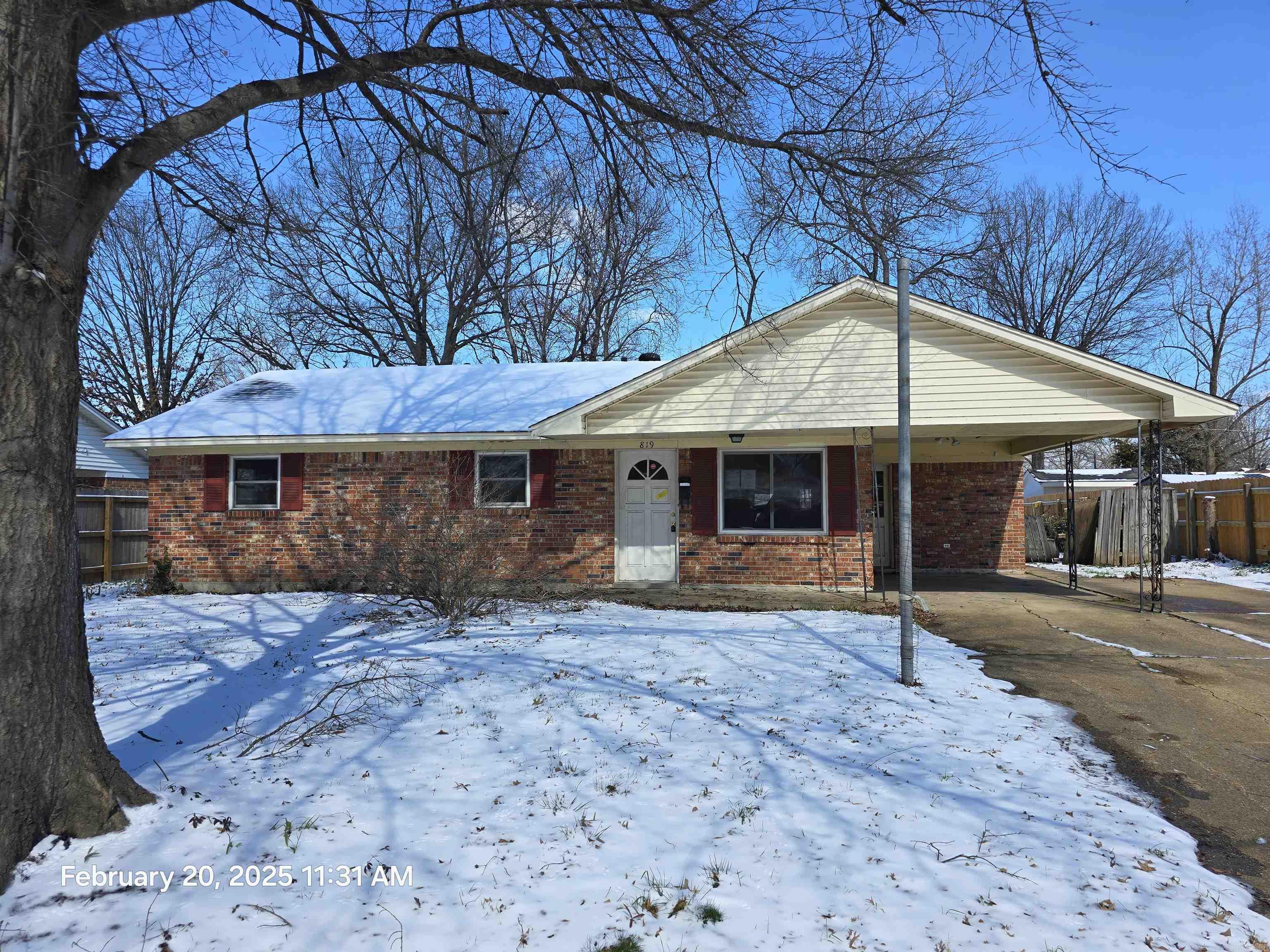 Three-bedroom 1.5 bath home brick/siding exterior, single attached carport, shop in back yard with rollup door and man door, Central heat & air, large living room, with open area to kitchen, den could be made into 4th bedroom, has half bath. The property is sold "as is" where is" Seller has no knowledge of condition, buyer should perform their due diligence and make their own assessments.