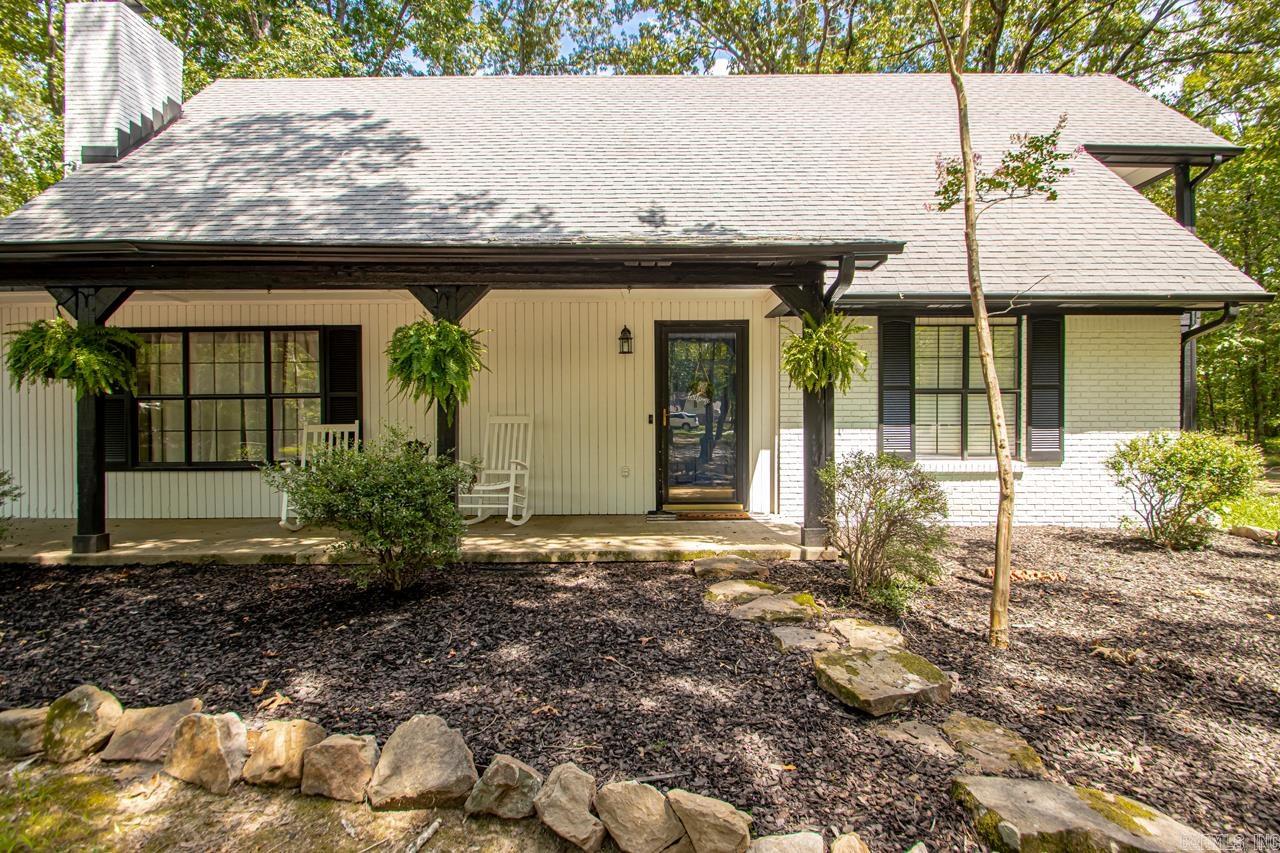 Call this one Home! New paint! New flooring! 2 Story w/cute balcony off one of the bedrooms upstairs! 2 bedrooms down w/full bath. 2 up w/full and 1/2 bath! You could have your primary bedroom up or down! All New plumbing!Luzury vinyl throughout except stairs and carpet is new! Roof 2012, HVAC 2019, HWH 2018! Room to spread out on 1.71 acres! Big front porch for sipping some sweet tea or how about a big back patio for BBQS!? Out of city limits! Come see it today before it's gone! See agent remarks..
