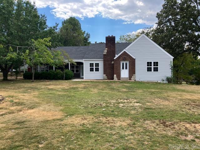 This beautiful home has been completely updated and renovated. The main level features approximately 2354 sq feet of finished space and contains the 3 main bedrooms and two bathrooms, one of which is a master suite. The remaining three bedrooms and bathroom are upstairs. In addition there is an unfinished basement that contains approximately 748 square feet, perfect for storage. The kitchen features beautiful granite countertops, new soft close cabinets and tile back splash, a new dishwasher and a stand alone island that features the new range with a nice built in vent hood above it and a set of pendent lights. Both bathrooms on the main level feature all new fixtures and tiled shower walls. There are two living areas, both with nice large ceiling fans and fireplaces. Lots of windows provide for natural lighting and there are tons of nice flush mount LED lights throughout the home. Out the back of the house, you will find a nice, new large deck and large spacious yard, located on a large corner lot.