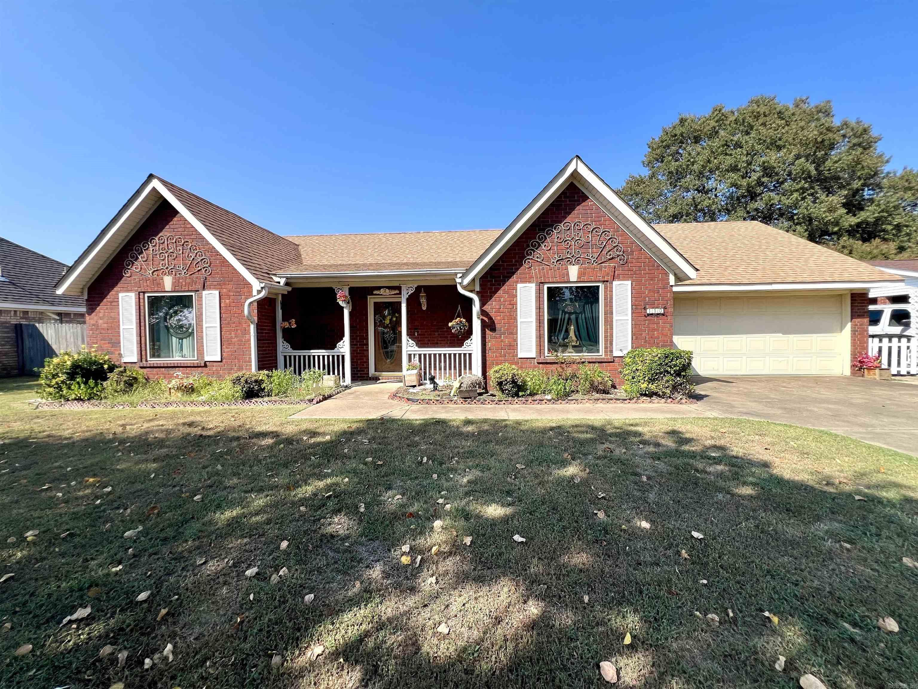 110 Flossie Dr. in Trumann, Arkansas has all the space you need with 2,116 square feet. When you walk through the front door, you have a nice entry area with a coat closet. The large living room and the spacious kitchen are the center of the home. The split floor plan offers 3 bedrooms and 2 bathrooms, a breakfast area off the kitchen, a separate dining room, and a laundry room. There is a screened back porch and a covered patio for outdoor living. There is a storage building in the fenced backyard. This home is ready for a new owner to make it their own. Call your favorite REALTOR® to schedule your personal tour!
