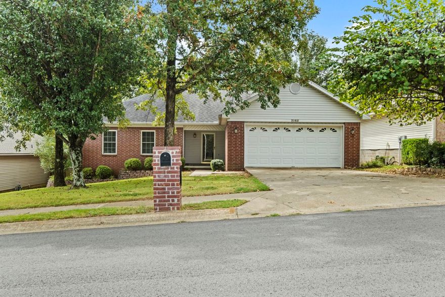 You cannot miss this beautifully maintained home in the covetted Woodruff Creek Subdivision.  This 3 bedroom, 2 full bath home will not disappoint.  Spacious living room with cozy gas log fireplace, large eat in kitchen with quartz composite countertops.  Step out onto the back deck to relax in your large privacy fenced backyard with your morning coffee or entertaining.  Storage building conveys with property.  Home has gutters and a sprinkler system for all of your landscaping.  HVAC was replaced in 2019, new luxury vinyl plank flooring and carpeting (in bedrooms) as of August 2024!  This home is close to everything Sherwood has to offer like shopping and dining while still maintaining a family neighborhood feel.   Make this your family's new home today!