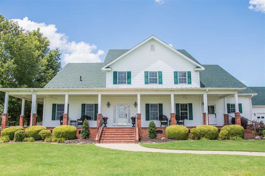 Gorgeous home on over 20 beautiful acres in the Terra Hills Subdivision w/everything you could want from a wrap around porch to an amazing outdoor kitchen & in-ground pool. Main floor offers hardwood floors, large family room w/fireplace, sunroom, den, deluxe kitchen w/granite counters & high-end appliances, formal dining room, office & a spacious master suite w/dual vanity, walk-in closet, walk-in shower & jet tub. Upstairs has extra bedrooms, each with their own private baths. Truly a one of a kind place!