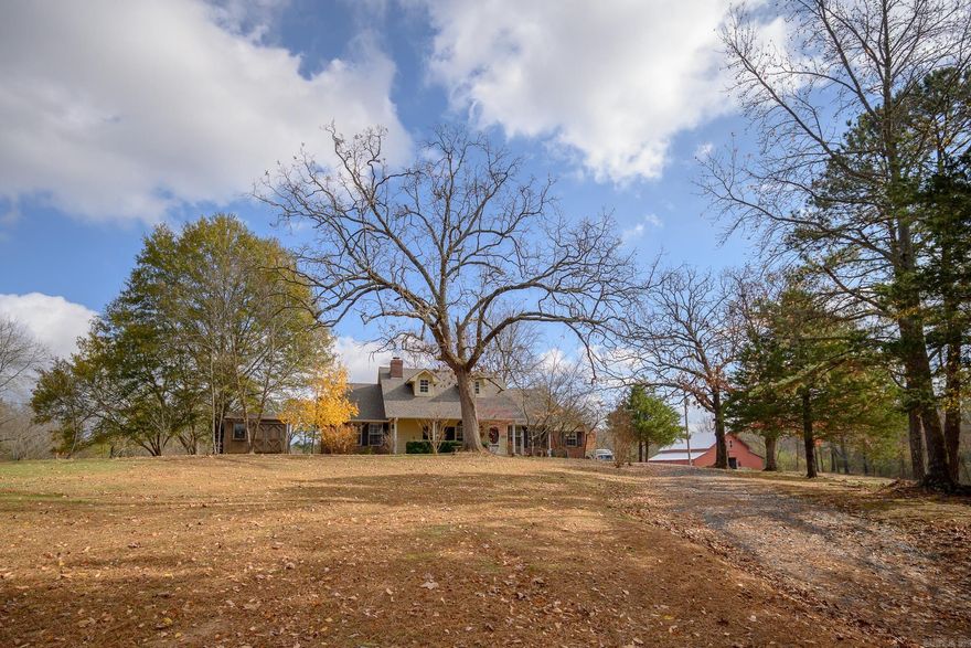 Welcome to a beautifully maintained country retreat located just 7 miles from Mena in the Potter community. Built in 2007, this inviting 3 bedroom, 2 bath residence offers a warm blend of comfort, updates, and scenic surroundings. Step inside to find a meticulously cared-for interior featuring a wood-burning fireplace and a brand-new electric range, just to name a few of the recent updates. Recent improvements—new roof and gutters installed in 2025—provide peace of mind for years to come. The property is perfectly set up for a rural lifestyle, offering a large barn, gated entry, and attractive vinyl fencing along the county road. Take in the picturesque landscapes while enjoying quick access to bike and hiking trails, as well as the stunning Rich Mountain. This property is a rare find—beautifully maintained, thoughtfully updated, and ideally positioned for both relaxation and adventure.