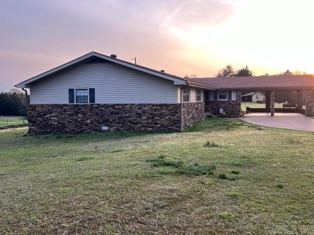 Are you ready to move to your own spacious farm? Just far enough out to fully enjoy country life, but shopping, medical, restaurants, and even I-40 is just minutes away?? Here is the perfect mini farm for you! Located on 20 acres with an updated 2100 sq ft farmhouse is the perfect set up for you. Cleared, fenced, barn, large pond, totally new kitchen from floor to ceiling, wood burning fireplace, and the list goes on. (Chicken coop does not convey) It's a definite MUST SEE! Make your appointment today!