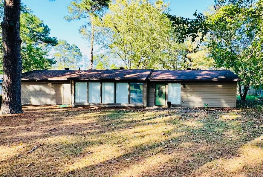 A Hidden Gem! This 2 bed, 1 bath home is perfect for a first home or to add to your rental portfolio. The kitchen, dining and living areas offer an open concept setting. Granite countertops in the kitchen, coffee nook and bathroom. The up to date bathroom has a double sink vanity and ample cabinet storage. A large backyard and a 2 car garage with laundry area. The kitchen refrigerator, washer and dryer transfer with the sale of the property. The neighborhood is quiet and peaceful but close to the city.