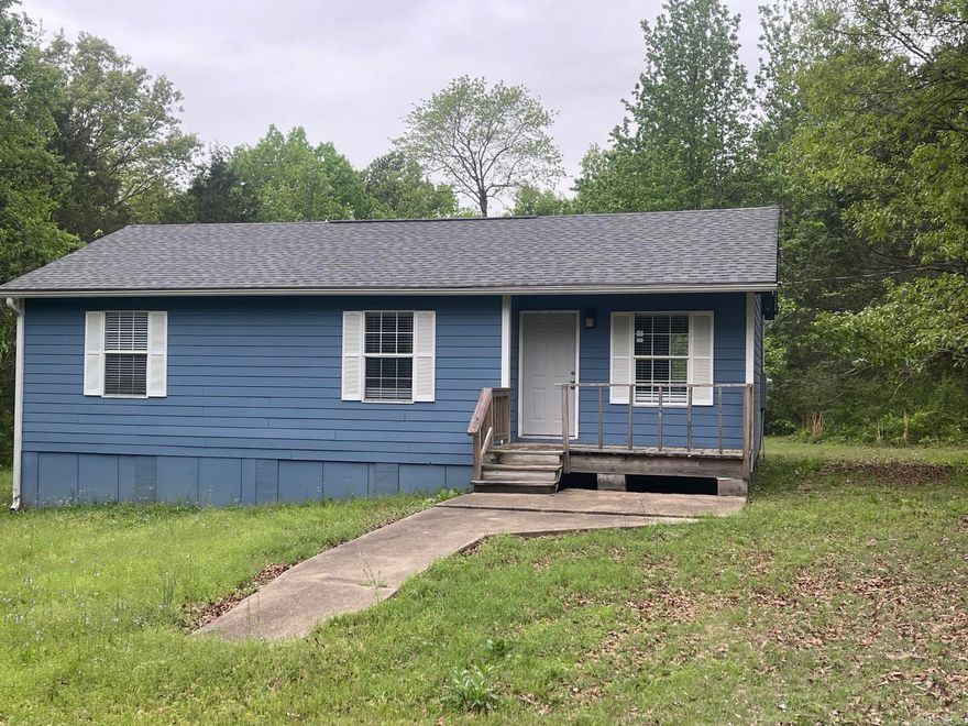This home is move-in ready and has been updated with a modern look.  The kitchen has lots of cabinets, a dishwasher, and a built-in microwave, butcher block counter tops, and a room off the side for extra storage. New ceiling fans & 2-inch blinds installed, very private location. Just minutes to Greer Ferry Lake. Great starter home, retirement, or vacation home