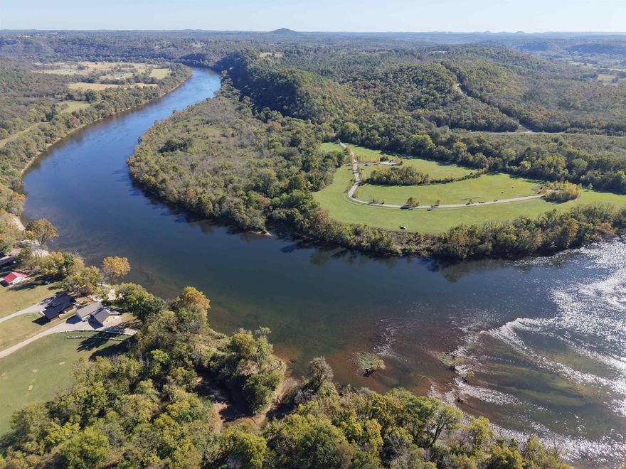 Experience world-class trout fishing with 4,000 feet of White River frontage on the legendary Steamboat Shoals, just downriver from Norfork, Arkansas. This is a rare opportunity to own an extraordinary 209-acre property on one of the most renowned rivers in the world.  The property offers direct frontage along Highway 177 West, just beyond Norfork School, and a private road that leads directly to the White River. This property is also ideally located only minutes from the town of Norfork and the Blue Diamond Marina at Norfork Lake Dam. Along the river bottom, approximately 20 acres have been cleared into hay fields that stretch along the water’s edge, while the remaining acreage is covered in quality timber. The surrounding hillsides offer spectacular views of the White River, perfect for building an exceptional home or cabin.  A U.S. Army Corps of Engineers permit for a private boat ramp adds a valuable amenity for anglers and outdoor enthusiasts.  Offered at $1,385,000, this property presents a rare chance to own one of the most sought-after stretches of the White River—where world-class fishing, stunning natural beauty, and endless possibilities converge.