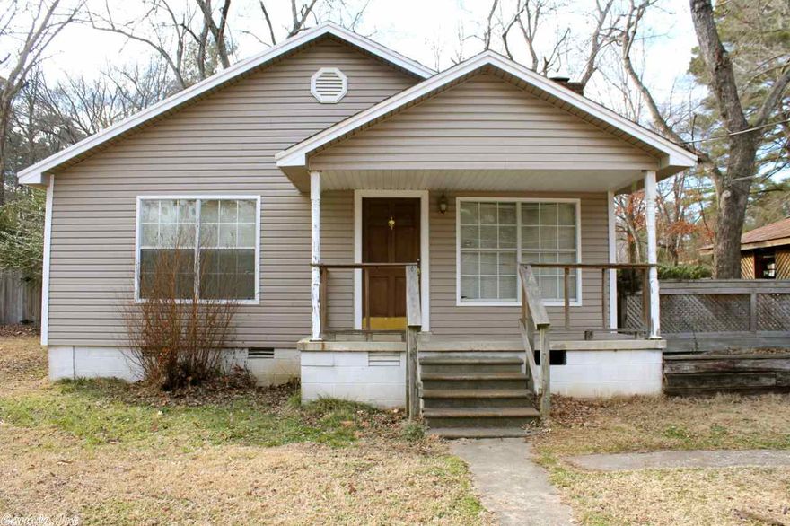 BANK APPROVED PRICE! This home has great bones and needs some TLC on the inside. Includes large detached shop, good sized rooms, beautiful wood burning fireplace. Recently replaced subfloor & partially remodeled guest bath ready for fixtures, with a good roof, good walls, good layout!  Price, taxes, lot size, & photos includes BOTH properties: 10826 & 10824 Legion Hut!  Priced to move! Bring us an offer! Sold AS IS.