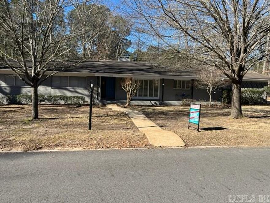 This home is a Must SEE!!  Lots of Remodeling!  New paint inside and out!  All three baths are brand new with the exception of counter tops in hall bath.  All new flooring in bedrooms and baths.  Two Master Suites with lots of closet space.  Den features full bar with sink, new mini refrigerator, and new ice maker. Also, has lots of windows and French Doors that open up to patio.  Plantation Shutters line the front of dining and living area.  Extra large backyard.    Contact Sondra at 870-904-6621 or Eiler Realty at 870-234-6621 and take a look.