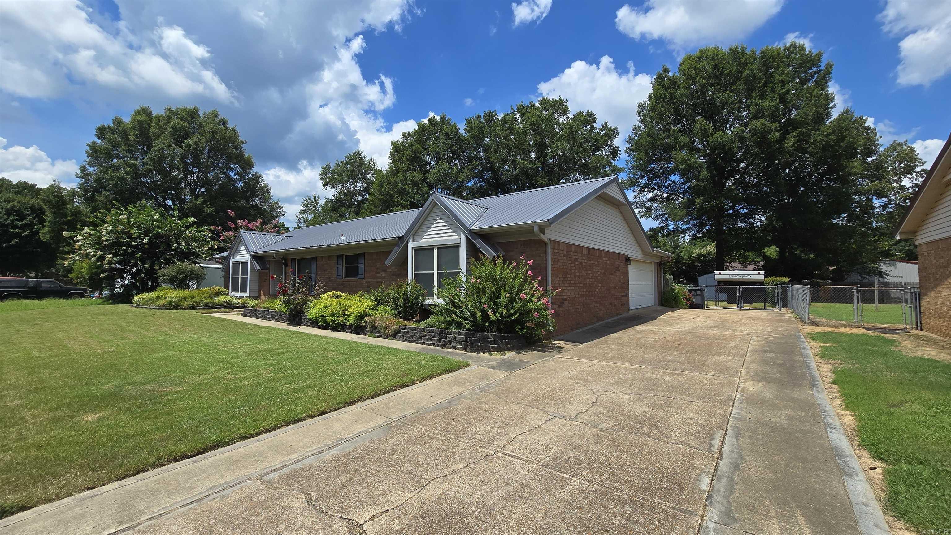 Discover your dream home in the heart of Searcy, AR, a vibrant town of 23,000 known for its small-town charm, top-rated schools, and endless outdoor adventures! This stunning 3-bed, 2-bath brick home boasts gleaming wood floors, newer appliances, and a durable metal roof. The fenced-in yard is perfect for pets or play, and the large backyard shop offers ample storage or potential for a custom workshop. Searcy is a gem in White County, offering a low cost of living with affordable property taxes and a safe, family-friendly community. The highly rated Searcy School District, with a 13:1 student-teacher ratio, ensures excellent education, with 51% math and 47% reading proficiency. Enjoy shopping and dining at local favorites like Midnight Oil Coffeehouse or explore the revitalized downtown with its art installations and festivals. Outdoor enthusiasts will love the nearby Little Red River and Greers Ferry Lake, just 20 minutes away, perfect for fishing, hiking, or kayaking. Only 45 minutes from Little Rock, Searcy blends rural charm with city access. Move-in ready at $219k ā seize this opportunity! Call today