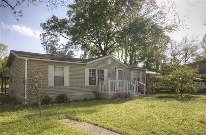 ADORABLE AND AFFORDABLE LAKE HAMILTON DOUBLEWIDE - SITUATED ON 2 LOTS - WITH COVERED BOAT DOCK - SPLIT FLOOR PLAN - OPEN KITCHEN/DINING/LIVING ROOM - SHOP - LARGE COVERED PORCH OVER LOOKING LAKE HAMILTON - COMMON PARK WITH BOAT LAUNCH RAMP - LEVEL LOT A MUST SEE!!