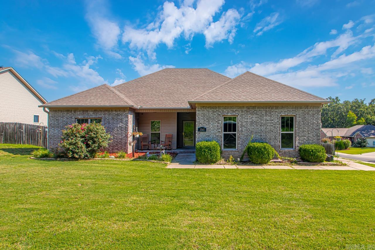 Step inside to see this charming single-level home sitting on a quiet corner lot in the Shadow Ridge Subdivision. This beautifully maintained property boasts a range of updates, including New LVP flooring, Updated laundry room with stackable washer/dryer included, Built-in cabinets added in dining room, a new dining room light fixture, Water Heater & Fridge (both 2023), and a New Garbage Disposal. The open floor plan features a spacious living room & a kitchen with great storage and countertop space, all perfect for entertaining. Enjoy the spacious feel of 9-foot ceilings. The home is equipped with a Nest Smart Thermostat and a Ring doorbell for added convenience and security. Step outside to a large fully fenced in backyard with a new pergola over the deck. The property also includes a new storm door, gutters, and a double gate in the fence for easy access. The primary suite, split from the other two bedrooms, offers his & her closets and double sinks. Additional features include an outdoor storage building & 2-car garage. Outside City Limits. Rural Development Eligible. Don't miss the opportunity to make this delightful home yours!
