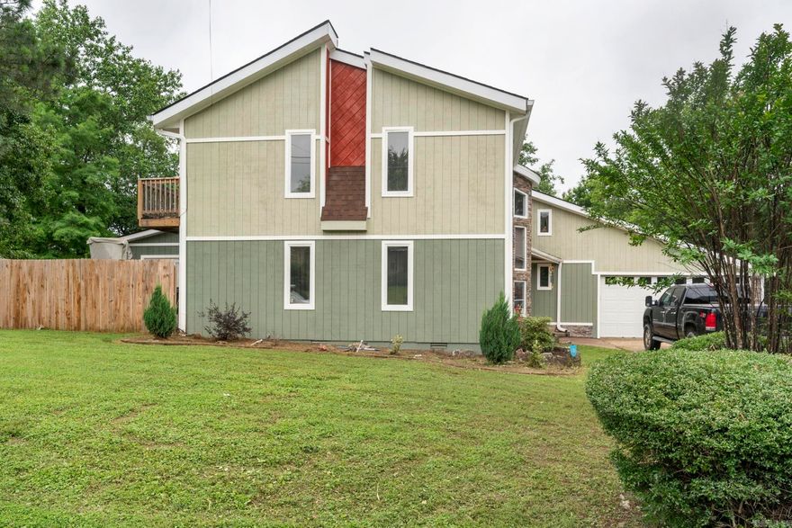 Fabulous opportunity in Hot Springs! 6 MINUTES FROM LAKE HAMILTON! Three bedrooms - 2 up and the primary suite is down. Step through the unique foyer into the beautiful open living/dining space. Off of the living room is a large sunroom. The kitchen is BIG and open! Great storage in the kitchen with a pantry and a short hallway walk to the large laundry room. Upstairs are two nice sized bedrooms and another living space. There is also a finished storage space that could be a 4th bedroom. Many updates throughout! All new wood siding and paint on the exterior. Fantastic composite deck out back for entertaining! Fenced backyard. 2 car garage. CLOSE to so many things! Oaklawn, schools, the lake, shopping and dining! Don't miss this one! No seller property disclosure.