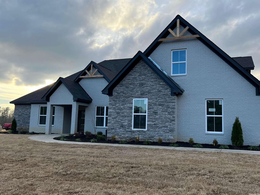 Upscale country living at it's finest. Come check out this spacious custom new construction home on 1.4 acres. This immaculate home offers a ton of detail and upgrades throughout. You will fall in love with open floor plan, making this a great space for hosting your friends and family. This home offers many great features that will be a must see upon completion.