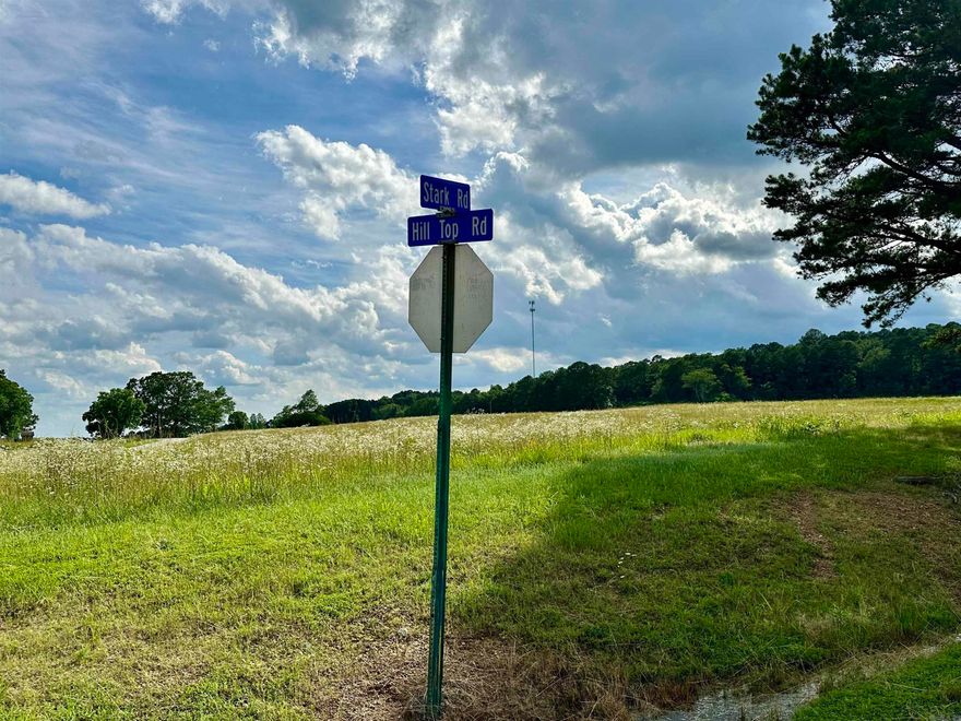 Beautiful property with incredable views of rolling pasture land and neighboring lake. 3/4 of the property is pasture and the remaining 1/4 is wooded. Paved road frontage on Hill Top Rd and Stark Rd. Approximately 1 mile to Rose Bud intersection. Dreamed of having a mini farm, this property is for you! Call for a showing today.