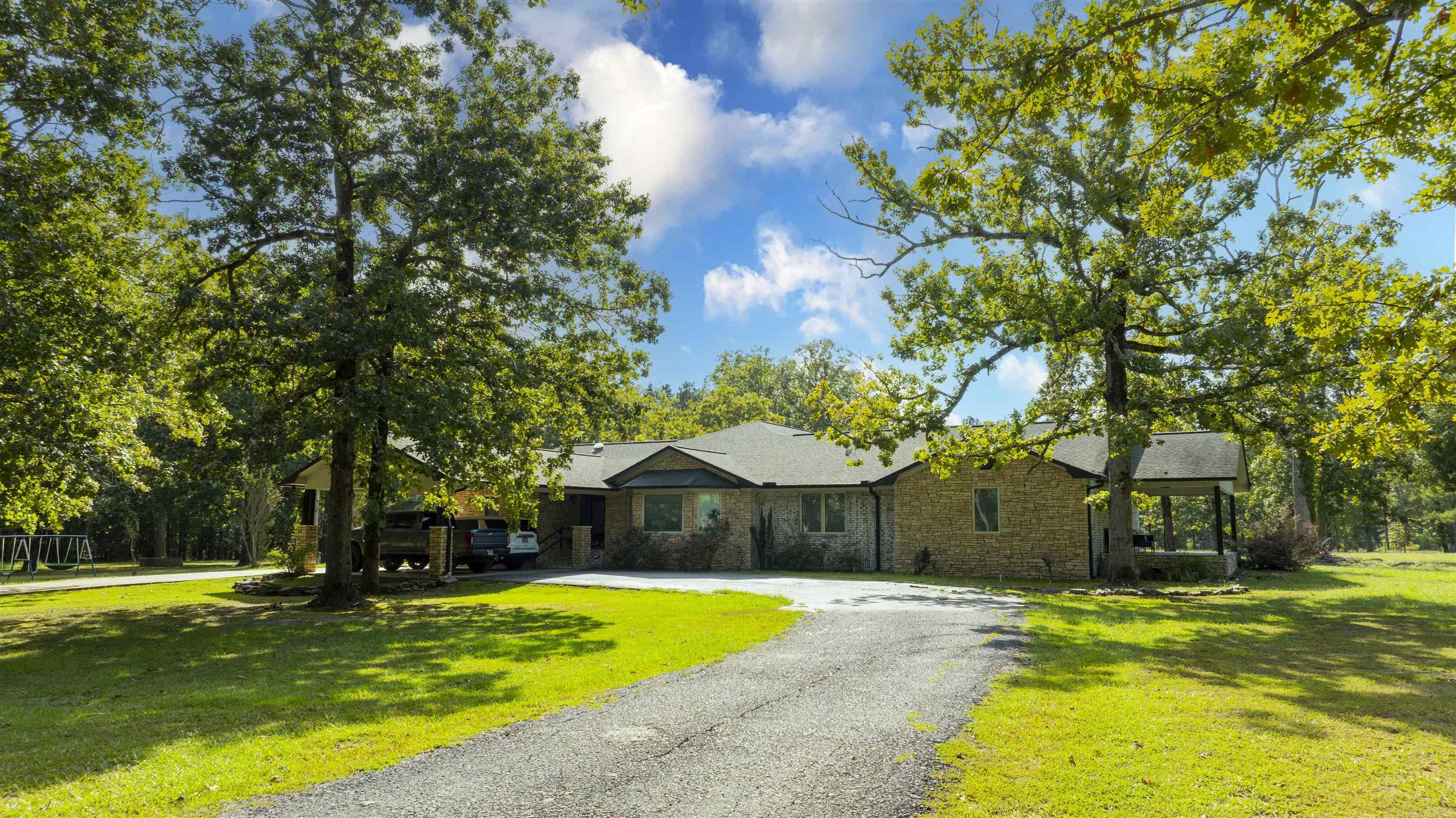 ?? 5022 Highway 7 South, Camden, AR 71701 3 Bed | 3 Bath | 4,053 Sq Ft | 14.25± Acres | Pond & Pool Enjoy peaceful country living just minutes from town! This spacious 4,053 sq ft home sits on 14.25± beautiful acres featuring a 1± acre stocked pond (2023) and approximately 4 acres of timber. Relax and entertain outdoors with a saltwater pool, serviced regularly by Glenn Mechanical, with a new pool pump installed in 2024. A private well system (installed 2020 and serviced/updated September 2025) provides reliable water for the home and property. Inside, recent updates make this home move-in ready! The Jack and Jill bath was completely remodeled in 2025, and new subflooring and flooring were installed the same year in the kitchen, hall, pantry, laundry, and bath areas. A humidifier system was also added to the crawl space in 2024 for enhanced comfort and protection. The property includes a large shop with covered parking, a storage building, a pool house for storage, and a well houseāoffering plenty of space for hobbies, tools, and equipment. If youāre looking for privacy, space, and modern updatesāall in one propertyāthis is it!