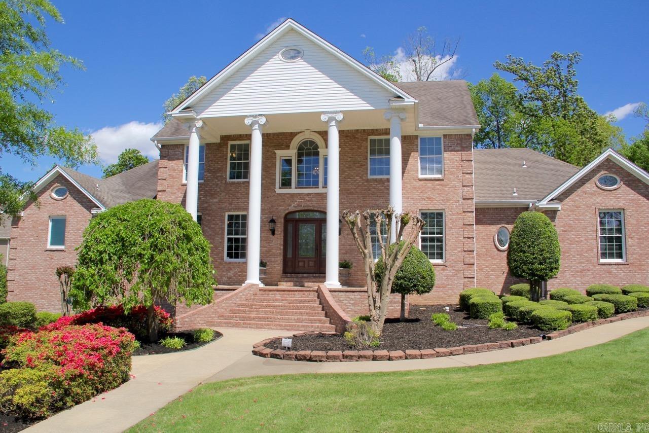 Stately home set high overlooking Dunwoody-Huntcliff on 1.07 acre landscaped lot, this impressive home has Five bedrooms and 4.5 baths in Valley View School district. Remodeled Open kitchen with quartz counters and plentiful custom cabinets connects to eat/in breakfast area that adjoins a sunroom with panoramic views to the fully fenced & private backyard with 2 decks. The kitchen is open to the vaulted great room with fireplace and arched windows also overlooking the beautiful backyard. Separate formal dining room and library/study. The main level also boasts a remodeled grand master suite with spa bath and large walk-in his and her closets. Large laundry area, and tons of storage throughout. Hardwood floors and lots of upgrades. Fully finished basement includes a game/family room, full kitchen, guest suite with large cedar closet, full bath, craft room, home theater and gym. Detached two car garage has a workshop and abundant storage above. The main house provides an additional 2 car garage plus tool room and a golf cart/motorcycle storage.