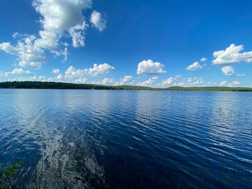 Prime Lakefront Living on Crown Lake  Experience the pinnacle of Ozark living with this exceptional 0.45-acre lakefront lot on the pristine shores of Crown Lake in Horseshoe Bend, AR. Boasting direct water access, this prime parcel offers a rare opportunity to build your dream home or a tranquil vacation retreat where the water is your backyard. Crown Lake is a premier 650-acre recreational destination known for its crystal-clear waters and premier fishing for bass, catfish, and crappie. Whether you envision a private dock for your pontoon, peaceful mornings watching bald eagles over the water, or sunset cruises through the rolling hills, this lot provides the perfect canvas.  Situated in a community that balances adventure with serenity, you are just minutes away from the Turkey Mountain Golf Course, local sandy beaches, and the charming amenities of Horseshoe Bend. With no Corps of Engineers restrictions to navigate and utilities available nearby, the path to your lakeside lifestyle is clear. Don't miss this chance to own a slice of Arkansas paradise where the pace of life slows down and every day feels like a getaway.