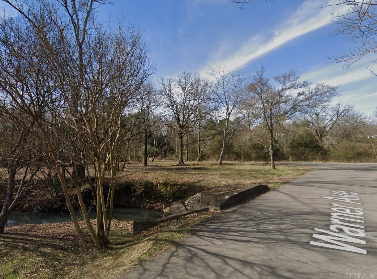 Awesome 4 acre property that runs along the high side of Ward Creek. Only 1.2 miles from the Mena Bike Trails at Ward Lake. With the rapid growth of our community and increased tourism to the area, this may be the perfect opportunity to capitalize on that potential. Possible Development Ideas: Tiny home park, Camping Sites, RV Park, Subdivide, Cul-de-sac subdivision, and more.
