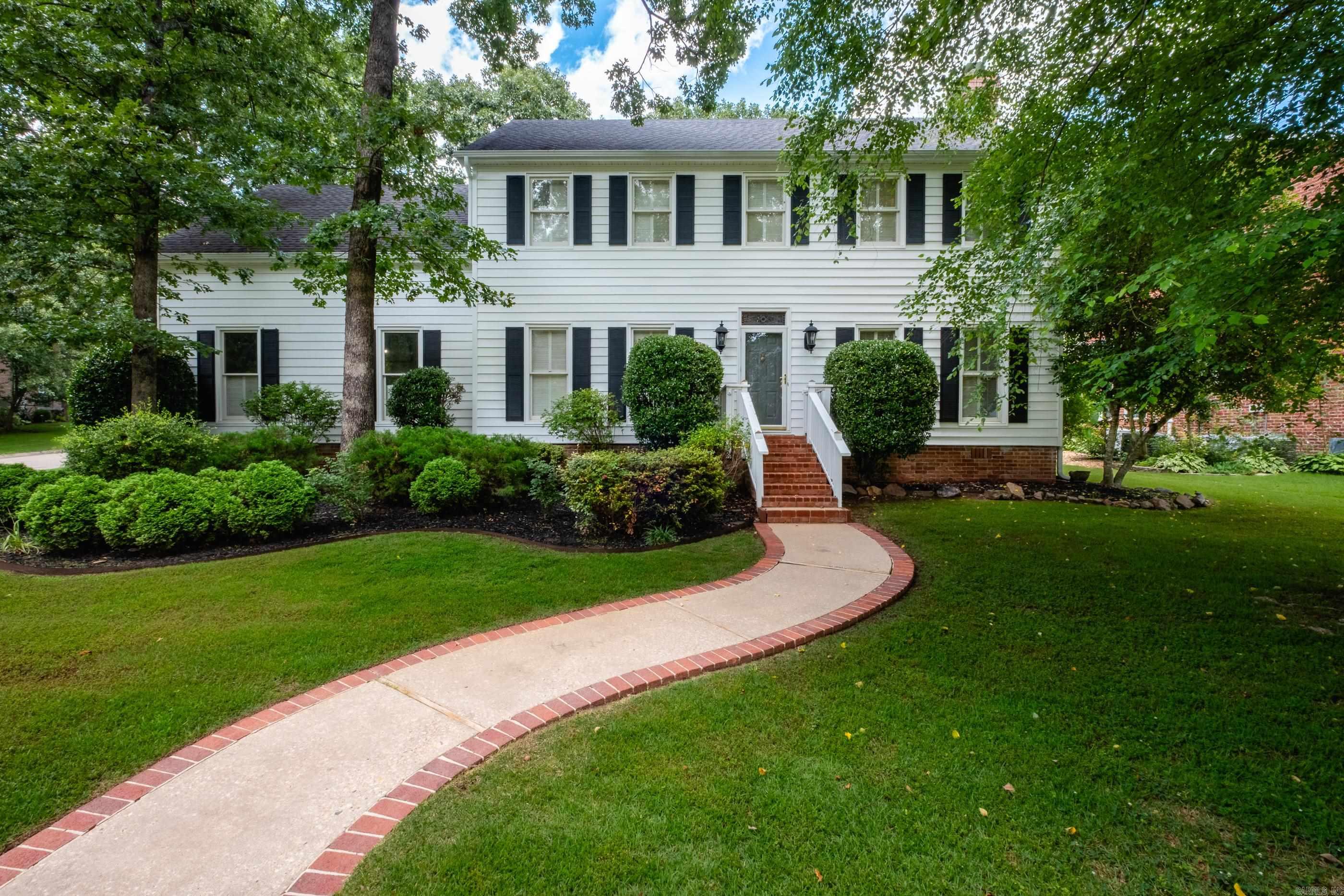 Welcome to this beautiful 2-story Colonial-style home, situated on a spacious corner lot in West LR. Large flat backyard with a newly added screened in porch perfect for enjoying your morning coffee or relaxing evenings. Inside you will find hardwoods throughout the main level and a bright and inviting kitchen with granite counters, double ovens and stainless appliances. The laundry room off of the kitchen also features a sink. Upstairs, you'll find spacious bedrooms, including a spacious primary suite with a walk in closet and en-suite bathroom. Just off the primary suite, a versatile bonus room over the garage offers endless possibilities ideal as a home office, nursery, or private retreat. Recent upgrades include new siding (2023), new fence (2022), screened in porch (2023). Don’t miss your chance to own this gem that combines classic style with today’s comforts. Agents see Remarks