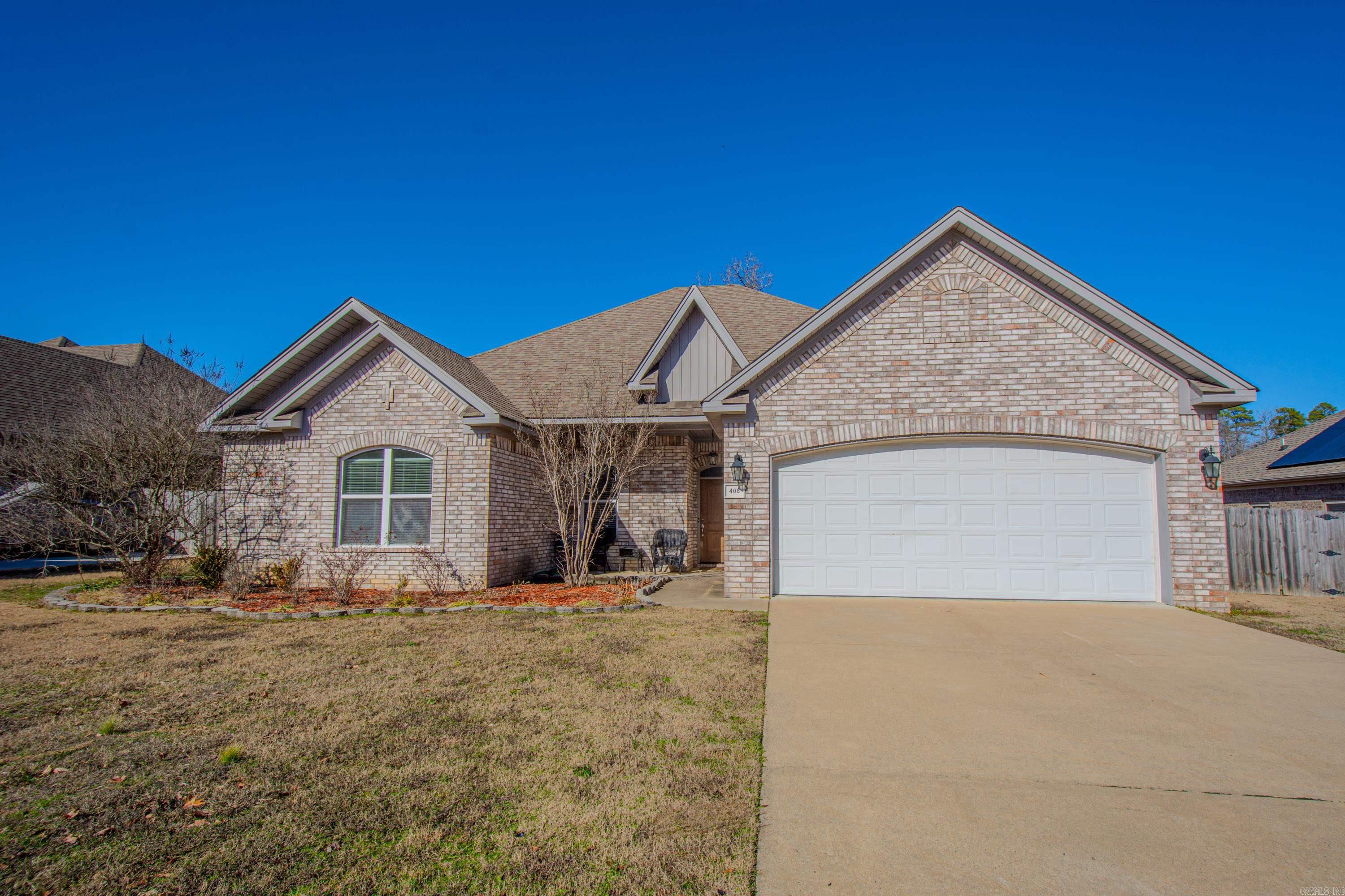 Open Family, Kitchen and Dining with split floor plan. Large Family room with gas log fireplace, crown molding, built-ins and lots of natural light all open to Kitchen with granite, stainless steel appliances and Pantry, all open to Dining with large windows overlooking backyard. Entering from garage is a Mudroom and Laundry Room. 3 Bedrooms with large closets, ceiling fans and bath. Large Primary Bedroom suite with ceiling fan, 2 walk-in closets, soaker tub and shower. Backyard is level with wood fence and no backyard neighbor. No Carpet! Chest Freezer & Washer/Dryer DO NOT CONVEY. Docs Online