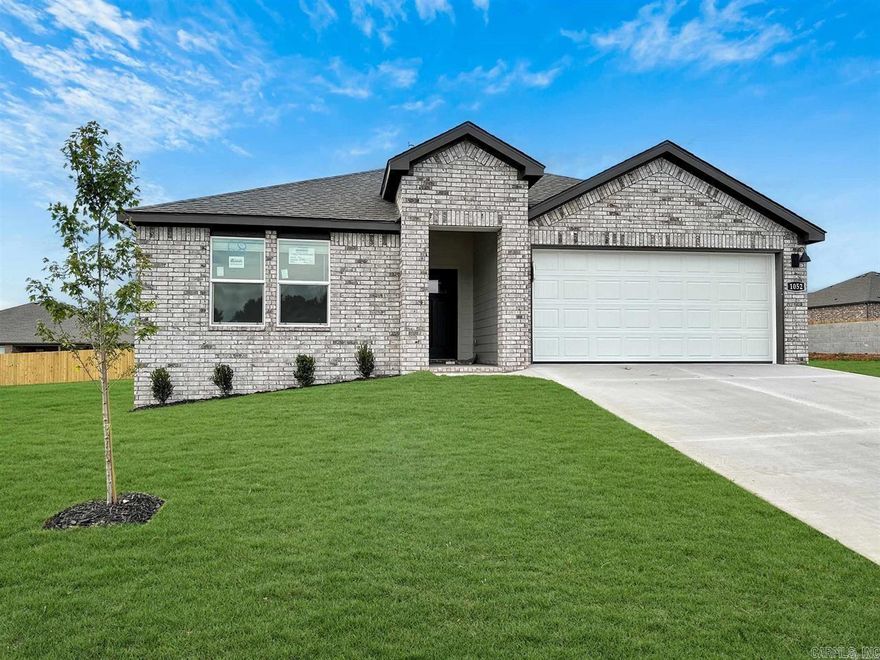 Hard to find BRAND NEW CONSTRUCTION RENTAL.  Four bedroom two bath!  Two car garage, open floorplan.  Quartz counters, stainless appliances and NO CARPET (all luxury vinyl).  Great family neighborhood and Bryant Schools.