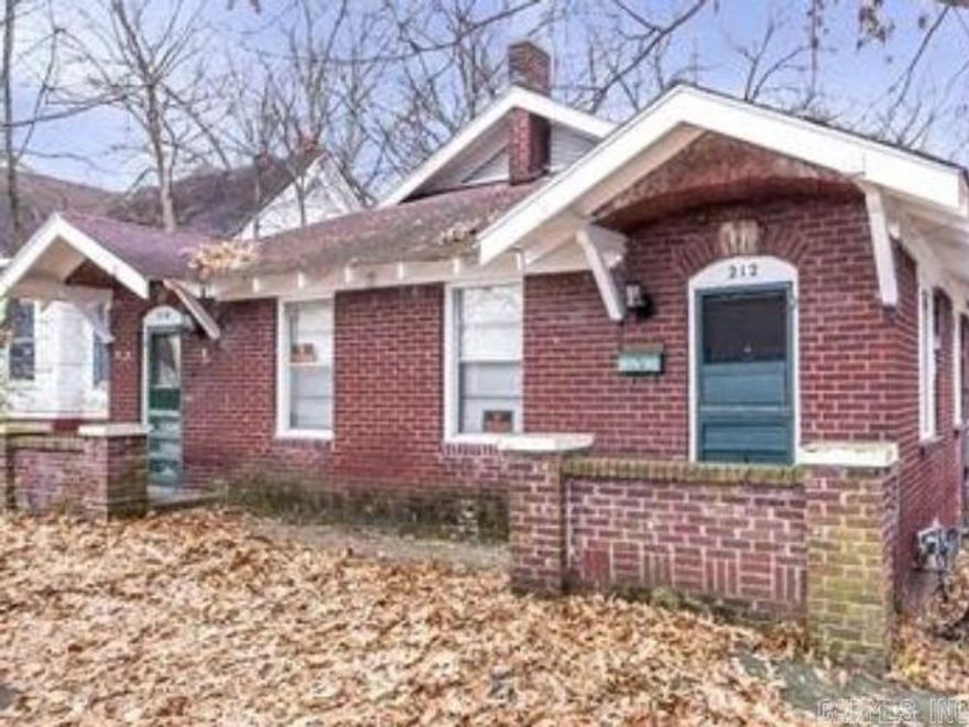 Updated brick duplex close to public transit, shopping and restaurants. New Pex plumbing, new HVAC (mini split systems). One side has an updated shower, new commode. Fridge, stoves to remain at no value. Off street parking and washer and dryer hookups in unit. Updated electric panels. Commercially zoned can be converted into an office for much higher rent amounts. No permission from planning required. Agents please see remarks