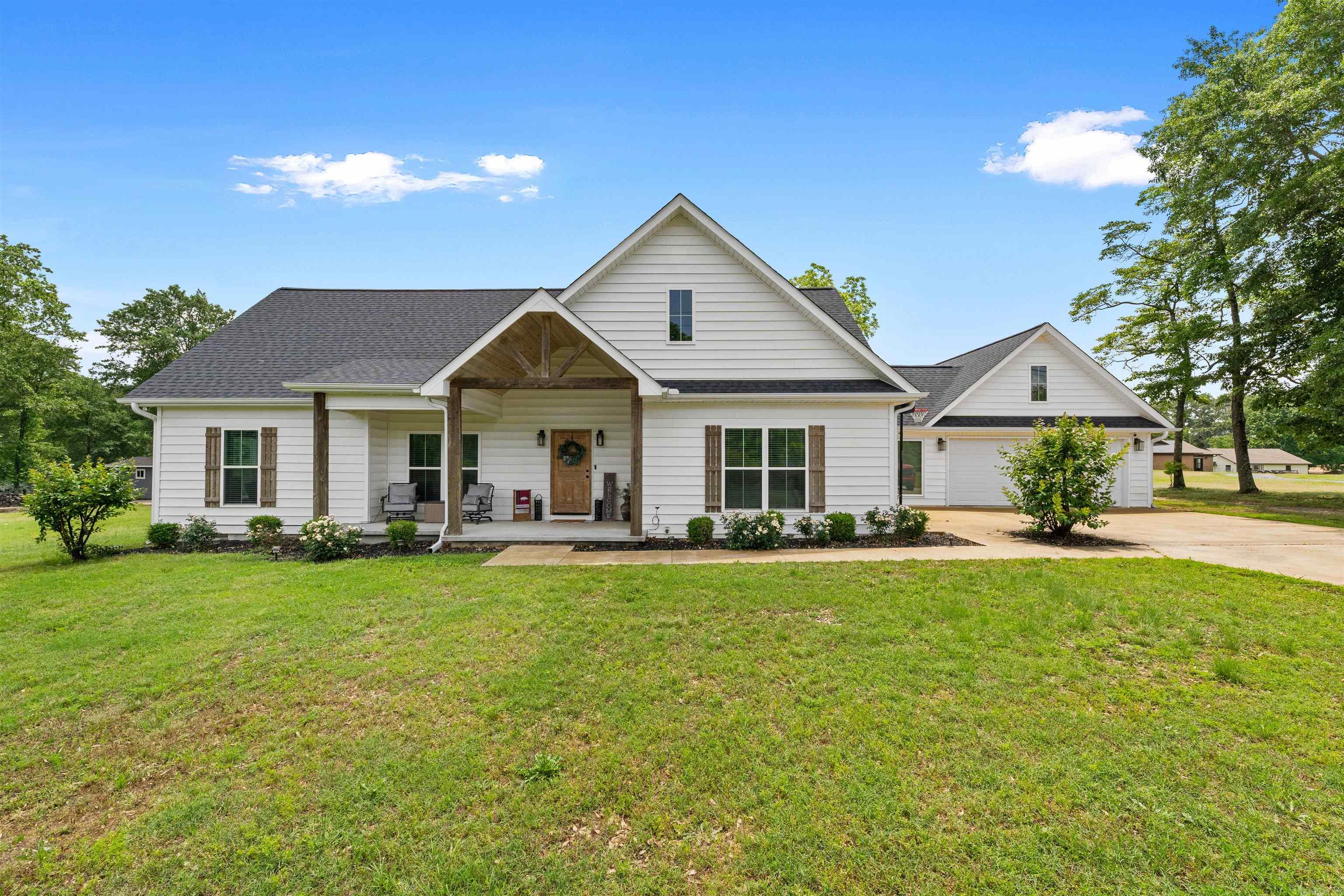 Location, Space, and Craftsman Charm meets modern convenience in this home on over 1.6 acres on Campground Road. Space upstairs perfect for bonus room with 1/2 bath. Enjoy the open living & dining area perfect for entertaining, along with a cozy small office space. Versatile breezeway space. Upstairs, discover a bonus room or 4th bedroom. Relax on the covered back porch or front porch and retreat to the stylish primary bath featuring a deep modern tub, walk in shower & trendy barn door. #startyourmovetoday to comfort and style