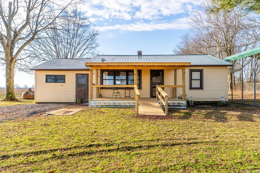 Welcome to Market 3022 Greene 415 Road in Rector Arkansas! This charming farm house sits on one +/- acre. It is country living with a short drive to town, and close to the bigger cities of Paragould, and Jonesboro. It is a spacious three bedroom, and one bath room home. There is a large den located off the living room that can be converted to an additional bedroom. The front porch was built in December. Recently installed new gas stove, radiant heater, and new supply lines through out.  There is a large two car garage, or can be used for a workshop, or a place to do your hobbies.. A large covering for your vehicles, and one for your RV, or boat.  Relax in the peacefulness of nature, and watch the deer run across your land. There are two mature pecan trees, and a walnut tree also.  In the back there is a dog pen, or could be converted for a chicken coupe, along with a garden area! There are no restrictions out here. Don't miss the opportunity on this one as it is priced to sell!