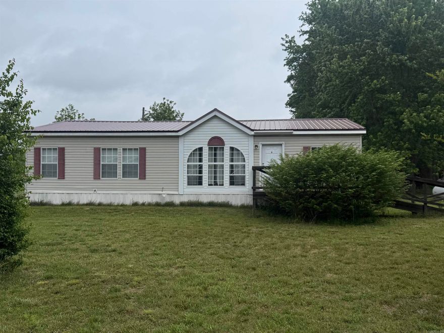 Room to breathe, space to grow. Welcome this 2009 mobile home offering 1,960 sq ft of comfortable living, set on 2 peaceful acres in a quiet country setting. Inside, you’ll find a spacious layout with plenty of room for family, entertaining, or simply spreading out. Step outside and enjoy the large back deck—perfect for morning coffee or winding down in the evenings while taking in the open surroundings. The home has a new metal roof. The property includes two storage buildings, giving you ample space for tools, equipment, or hobbies. A standout feature is the additional ready-to-go homesite, complete with its own setup—ideal for a second mobile home, guest space, rental opportunity, or future shop. With well water already in place, you’ve got the essentials covered for country living with flexibility and potential. If you’re looking for space, functionality, and the freedom of rural living, this property delivers.