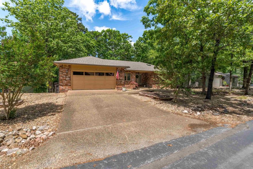 This beauty has 2 decks for all your entertaining needs! With a NEW roof in 2024, gas logs installed in 2025, new PEX lines in 2024, and a new stainless steel sink and faucet...this house is move in ready! The crawlspace is insulated and comes with the dehumidifier. Level driveway and low maintenance yard! Hardwoods floors in most of the house and newer carpet in 2 bedrooms. Gorgeous Roman shades in all the bedrooms and the dining room make this home inviting and cozy. Call today for your showing! AGENTS SEE REMARKS