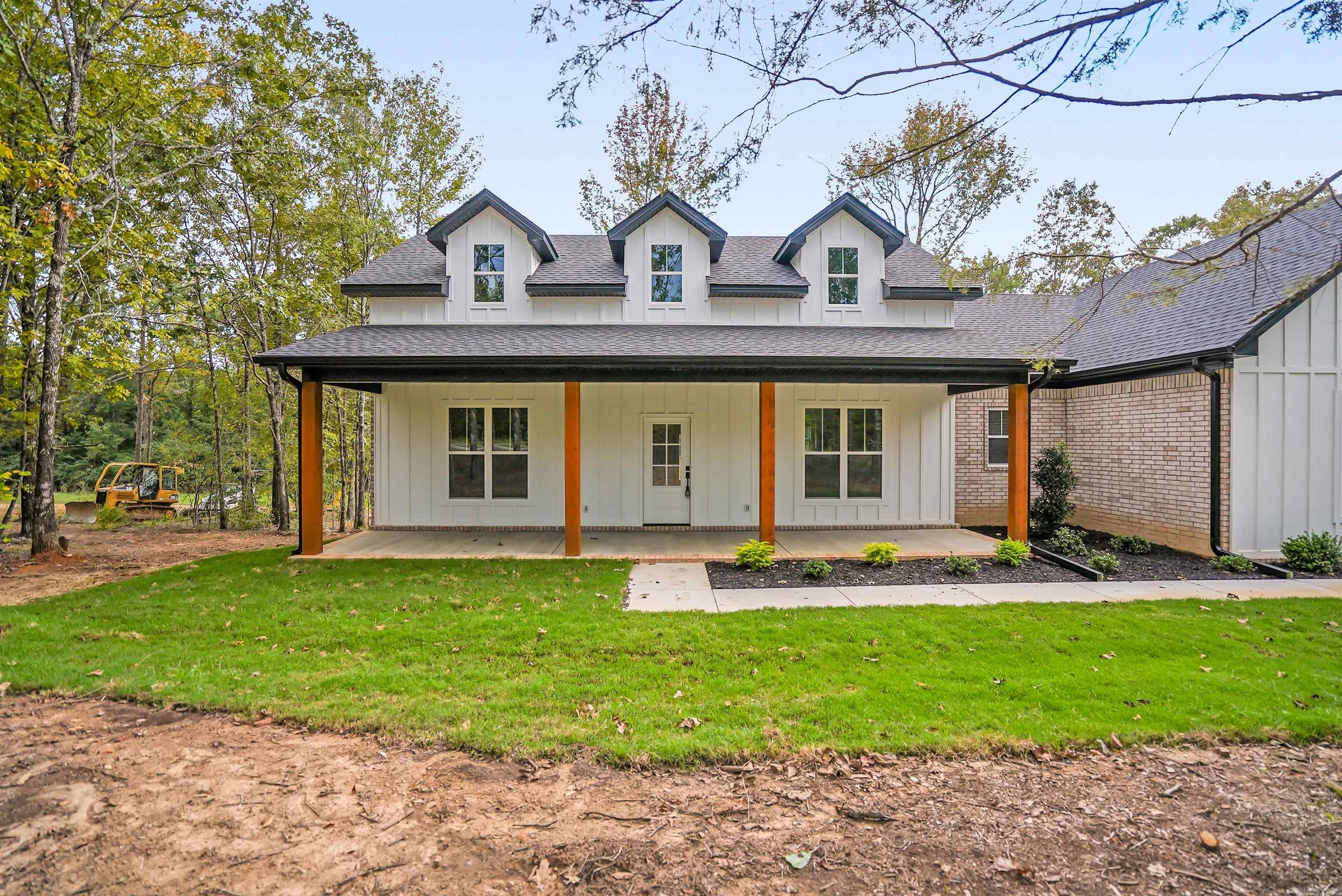 Brand new construction on 1 Acre in Vilonia! This beautifully crafted 3-bedroom, 2-bathroom home is one of three exclusive builds on Sellers Road by the reputable Emerald Custom Homes! Ready for its new owners! With 1,768 sq ft of thoughtfully designed living space sitting on a sprawling one-acre lot, this home blends modern comfort with country charm. Step inside to enjoy tall ceilings that add an open, airy feel and a spacious kitchen featuring a walk-in pantry and an abundance of cabinet storage—perfect for home chefs and entertainers alike. Whether you're looking to settle down or upgrade your lifestyle, this home offers the space, quality, and tranquility you’ve been searching for—all just a short drive from local schools and amenities. Tax data for lot only. Schedule a tour now!