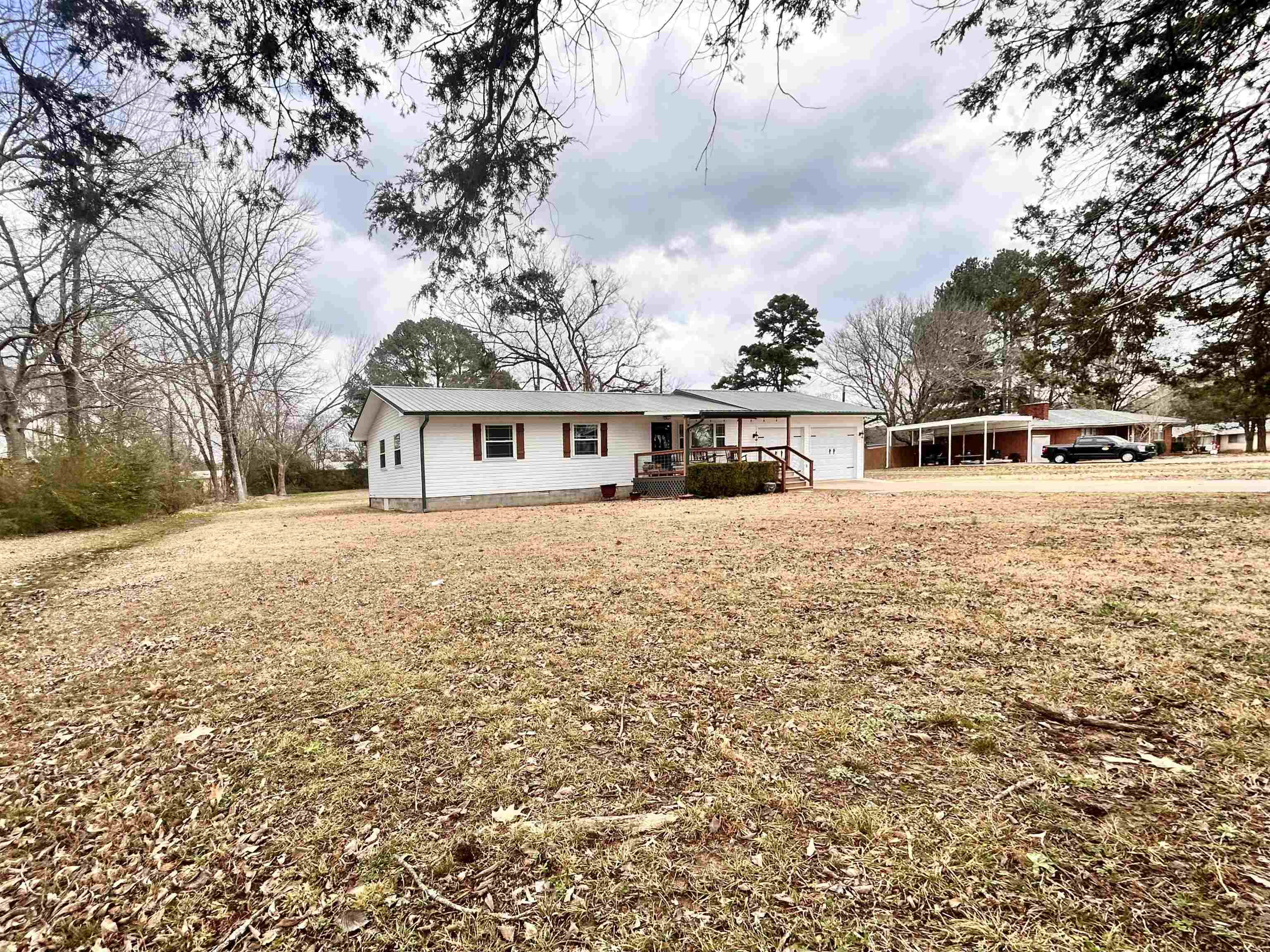 Looking for a weekend home or the perfect starter home...This 3 bedroom 2 bath home is located right in the heart of Heber Springs. Newly remodeled kitchen, flooring and bathrooms. Mini split in the garage to host all events year round. New gutters along with AC. Large shop in the back for plenty of storage and sitting on a 1 acre lot!!! Call or text listing agent for showing.