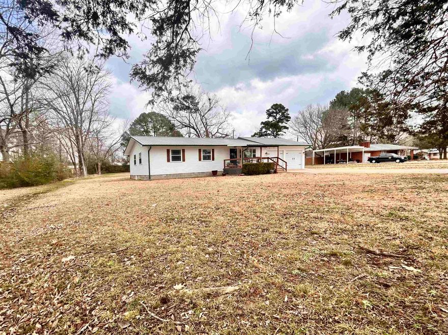 Looking for a weekend home or the perfect starter home...This 3 bedroom 2 bath home is located right in the heart of Heber Springs. Newly remodeled kitchen, flooring and bathrooms. Mini split in the garage to host all events year round.  New gutters along with AC.  Large shop in the back for plenty of storage and sitting on a 1 acre lot!!!  Call or text listing agent for showing.