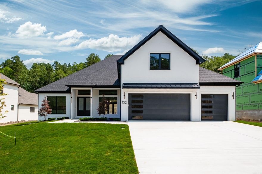 Luxury amenities galore in this stunning new construction home located at 132 Abington Drive in Chenal Valley.  Freshly painted soft white and neutral hues in the spacious open living area which includes the kitchen, dining, great room and a study.  The great room's focal point is the gas fireplace flanked by built-in cabinets.  The gourmet kitchen boasts beautiful cabinetry, and two islands each featuring a waterfall countertop.  Entertaining both indoor and out, as the home features a large covered patio with fireplace and a private fenced back yard. The primary bedroom and 2 additional bedrooms are on the mail level of the home making living on one level easy!  And if you need more space, there is an additional bedroom and bathroom upstairs, plus a game room.  Located in Abington Court, one of Chenal Valley's newest neighborhoods, beautifully developed with natural scenery and walkable streets. Window coverings and a privacy fence have been added.