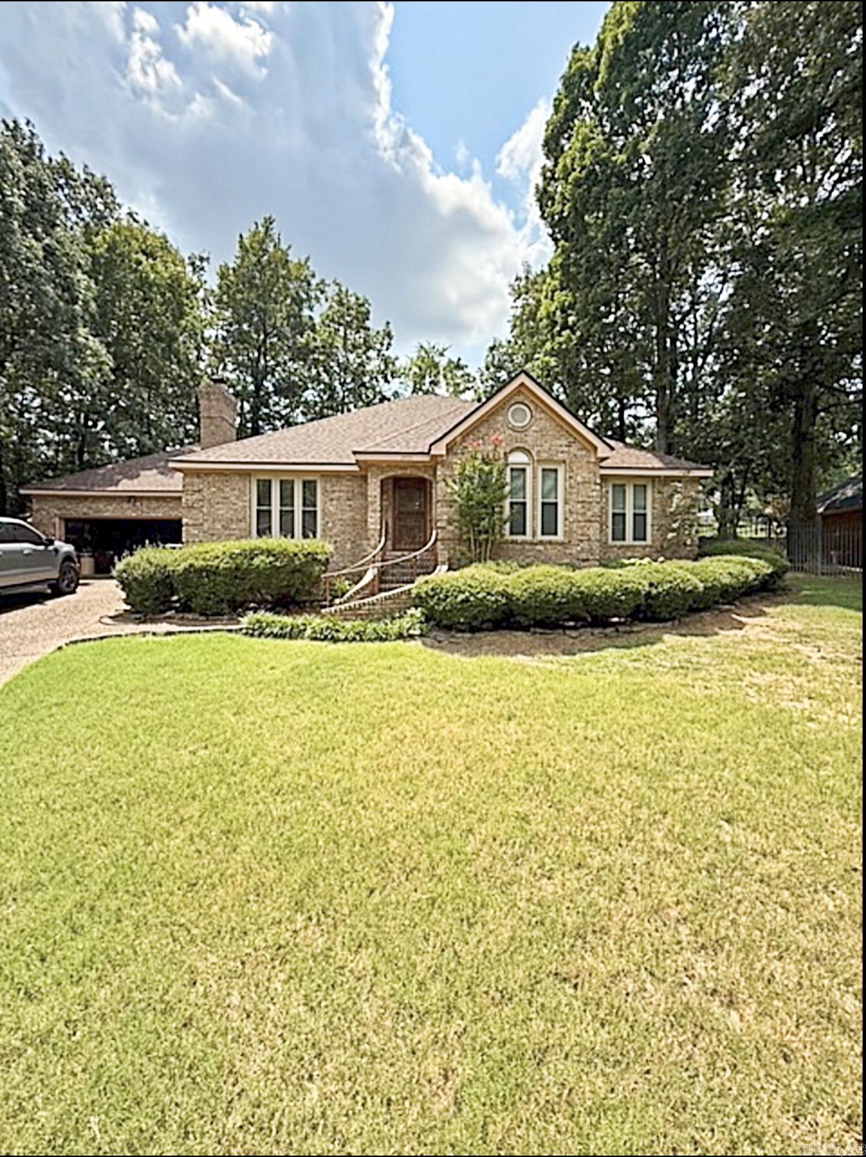 This all-brick home offers 2,086 square feet of in a highly sought-after, established neighborhood filled with mature trees and timeless appeal. With 3 spacious bedrooms, 2 full baths, a formal dining room, and a cozy sunroom that overlooks the backyard, the layout is ideal for both comfortable living and entertaining. The wood deck provides a great space to enjoy the peaceful surroundings. This home while move in ready, could be made into the new owners dream with updates. Major completed updates include a new roof was in 2024 and new furnace in 2023.