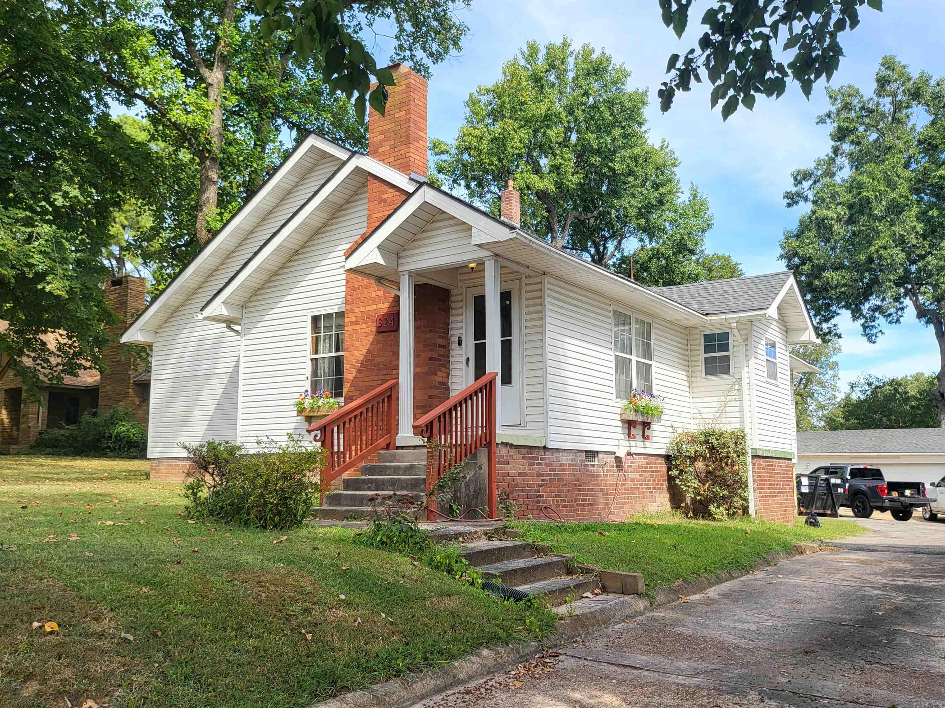 Discover this charming cottage-style home in the heart of Central Jonesboro! Nestled in one of the cityās most established and sought-after older neighborhoods, this āsister houseā is filled with timeless character and unbeatable convenienceājust minutes from schools, shopping, dining, parks, and downtown. Inside, youāll find beautiful original hardwood floors, spacious living areas, and thoughtful updates. Originally a three-bedroom, one-bath layout, the home has been remodeled to feature two large bedrooms, two full bathrooms, a dedicated laundry room, and a cozy formal dining area. A sunroom at the back of the house offers plenty of natural light and overlooks the private backyard, perfect for relaxing or entertaining. Enjoy mornings on the back porch with direct access to the detached garage and workshopāideal for storage or hobbies. This character-filled home combines vintage charm with modern updates in one of Jonesboroās most convenient, central locations. Schedule your private tour of 324 E Nettleton today!