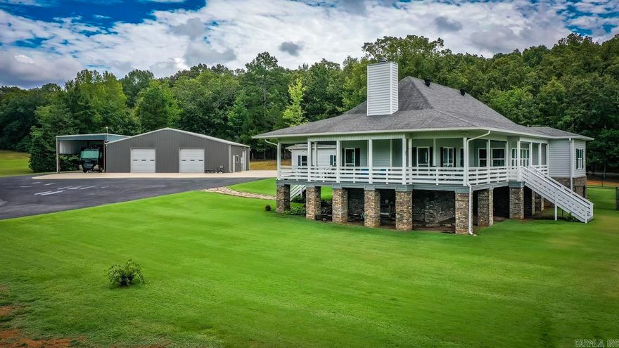 Look no more!!  Offering up this one owner pristine property that checks all the boxes!  Beautiful Home sitting on 9.5 acres with a park like setting overlooking this beautiful lake that is a dream come true! This property has had no expenses spared when built, including a beautiful wrap around porch to catch that sunset overlooking the water.  Beautiful built in cabinetry throughout this home and plank hardwood floors to top it off. Enjoy your wood burning fireplace that centers the living area with an open concept to the kitchen that allows a perfect set up for entertaining guests. This property is in a gated area with only a handful of residents to share with, including entire access to the lake and fishing dock.  If that isn't enough, we also have a 2,500 square foot shop that comes heated and cooled with bathroom and laundry hookups to boot. There is also an extra 1,000 sq ft  attached Rv storage with 50 amp hookup, water and sewer hookups ready to go! There is an additional 6.6 acres that can be purchased if looking for more land as well. This is truly a one of a kind property that needs NOTHING but a new owner to enjoy!!  Come check this beauty out before its too late!
