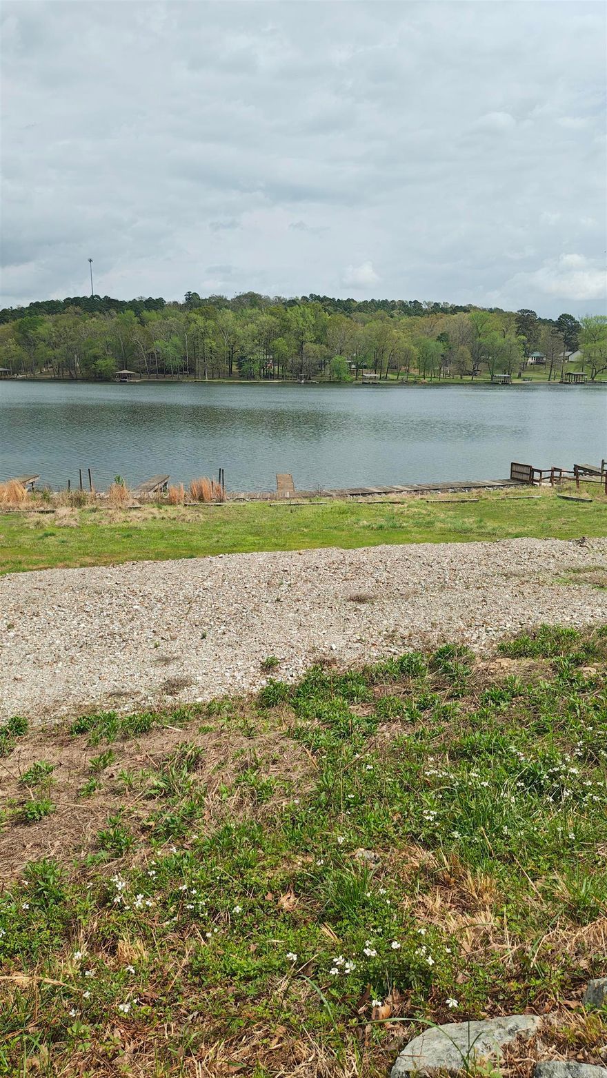 Owner financing available at 4.5% interest for 10 years, 25k down!!! NO DPOA dues until build. Includes boat slip. This beautiful lakefront lot is 7,125 sq. ft is right on gorgeous Lake Catherine. This lot is one of the few remaining lake lots with a view and access like this!!! Diamondhead Resort Community includes a PGA sanctioned 18 hole golf course, Olympic size pool, amazingly fun children's playground, tennis, basketball and pickleball courts, restaurant, library, and workout room!!!! Lake Catherine is 1 mile away offering hiking trails and beach. Only a few miles from the quaint downtown area of Hot Springs! Owner financing is available at 4.5 % interest!!!!! You are going to fall in love with this community and breathtaking views!!!