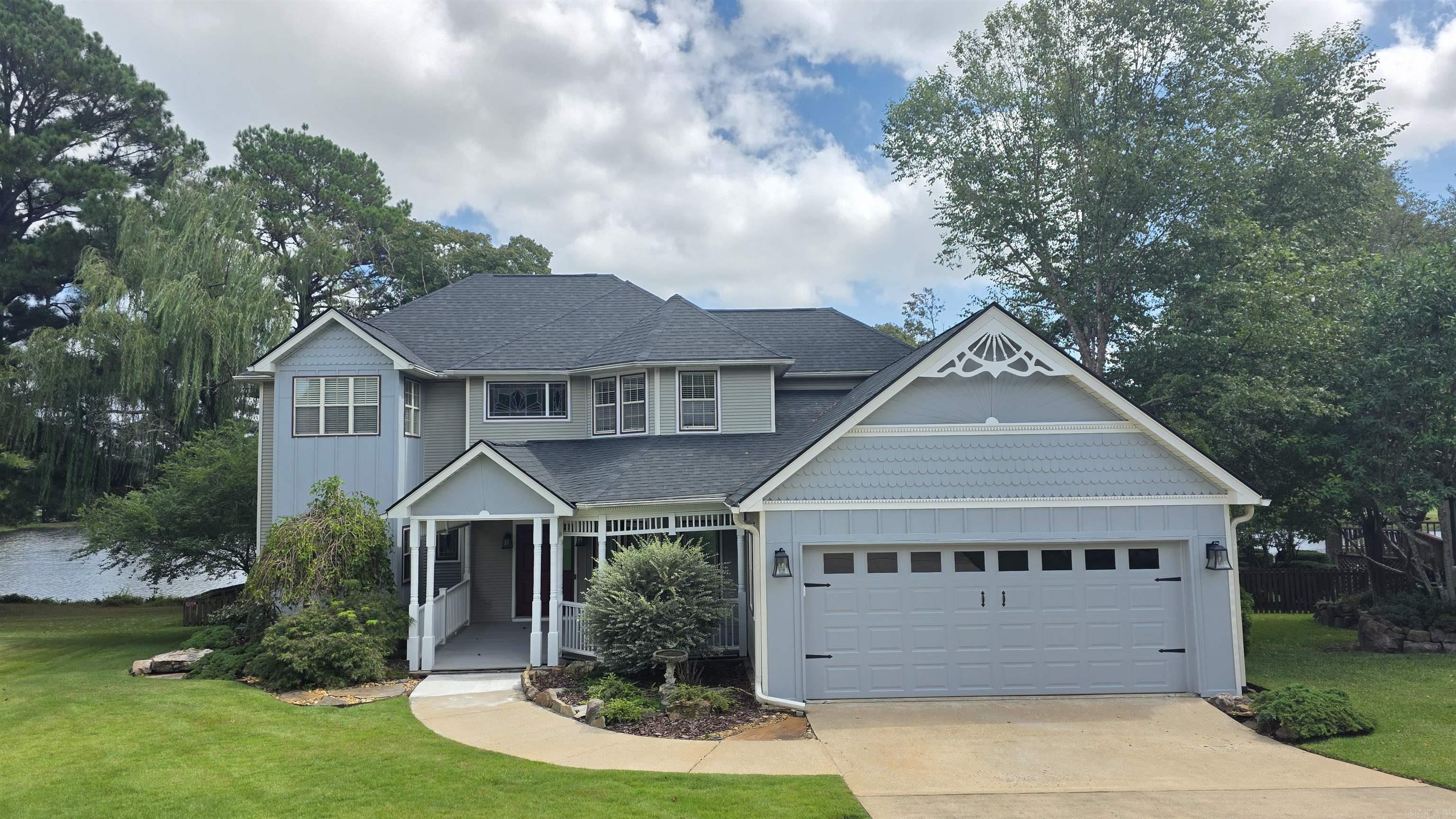 Welcome home to the Maumelle Country Club area. New exterior paint, French drain, and landscaping invite you in. This 5 bedroom 3.5 bathroom house has amazingly tall ceilings in the main living room area and fresh paint throughout. The kitchen offers a gas range, breakfast bar, pantry, and double oven. The primary suite is big enough for your California King. Enjoy your morning coffee, afternoon tea, or late night snack in your private sunroom. Upstairs there are four bedrooms and a bonus area. The backyard has a new deck that over looks the tee box to hole 3 of the Country Club. You are just down the street from the Community Center in Maumelle, walking trails, shopping, dinning, entertainment, and the fire station. SQFT is approx. Please measure. ***AGENTS SEE REMARKS***