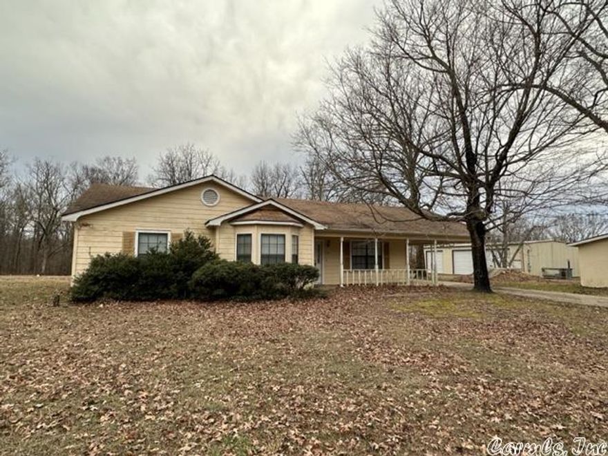 Relax, unwind and enjoy peaceful living on 86 +/- unrestricted acres in this 3 bedroom, 2 bath home.  Quiet country roads near the Missouri/Arkansas line will guide you to this property, surrounded by mostly wooded acreage with some mature timber. The home features a desirable floor plan, a generous sized master bedroom with walk in shower in the adjoining bath, walk in/oversized closets, kitchen appliances and washer/dryer, extra storage room/office space on carport, and is equipped with a Generac generator for backup.  Outside you will find a storm shelter, a large pond, an insulated three bay 40x60 heated shop with concrete floors, electric and a lift. Figh speed internet available at this location making country living convenient!!! Don't miss your opportunity, call to schedule your private showing today!