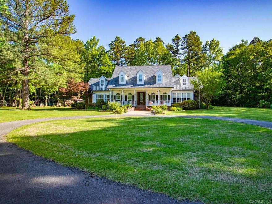 This stunning 4-bedroom, 4.5-bathroom home sits on a 6.44-acre horse farm, offering both luxury and practicality. The spacious living room features beautiful hardwood floors and a cozy fireplace. The formal dining area complements the eat-in kitchen with ample cabinet space. A dedicated laundry room and 3-car garage provide convenience. The master suite overlooks the picturesque pasture and opens to a flagstone patio, complete with a hot tub, 13-foot pool with a diving board, rock waterfalls, and a slide, plus an outdoor kitchen—perfect for entertaining. Upstairs, you'll find two separate wings—one with bedrooms and baths, the other with a game room, kitchenette, and bathroom. Additional features include a whole-home generator, a barn, utility shop, horse wash station, pond, paddock, and fenced/cross-fenced areas for horses. This property combines modern updates with equestrian amenities in a truly idyllic setting. Additional acreage of 2 adjoining 5+/- acre tracts could be bought as well.